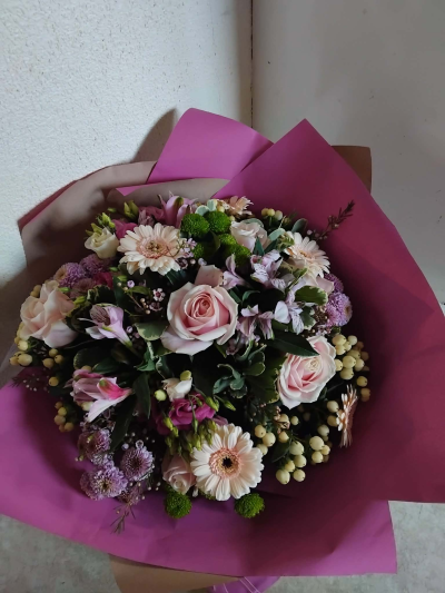 Pretty Perfect - A mixture of pink and peach seasonal flowers